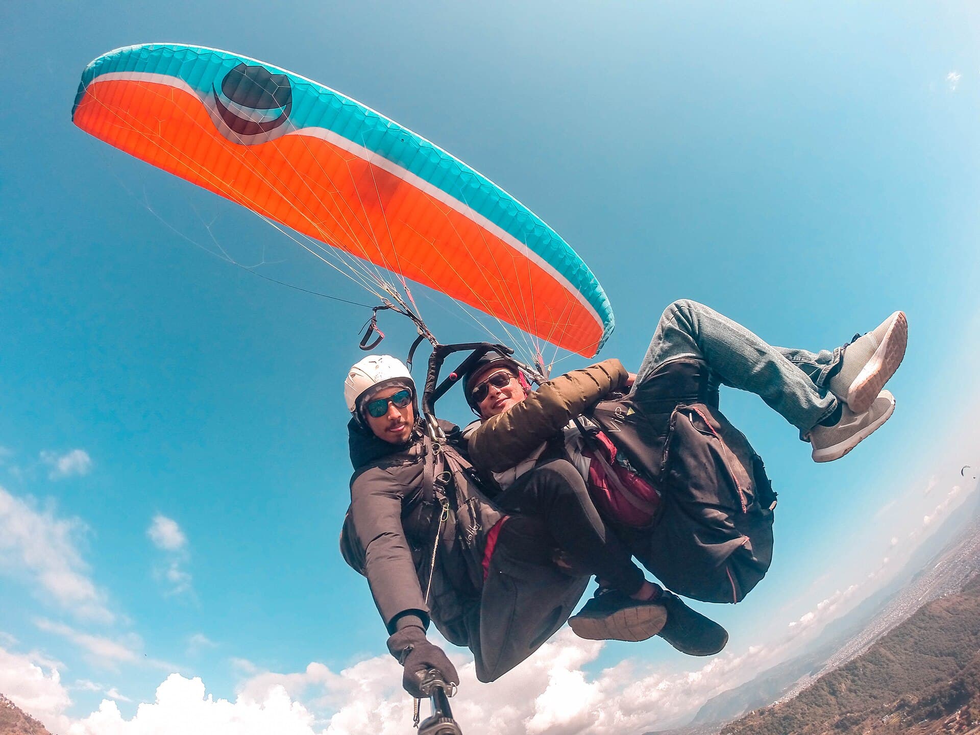 Tandem paragliding above the hills near Pokhara, Nepal